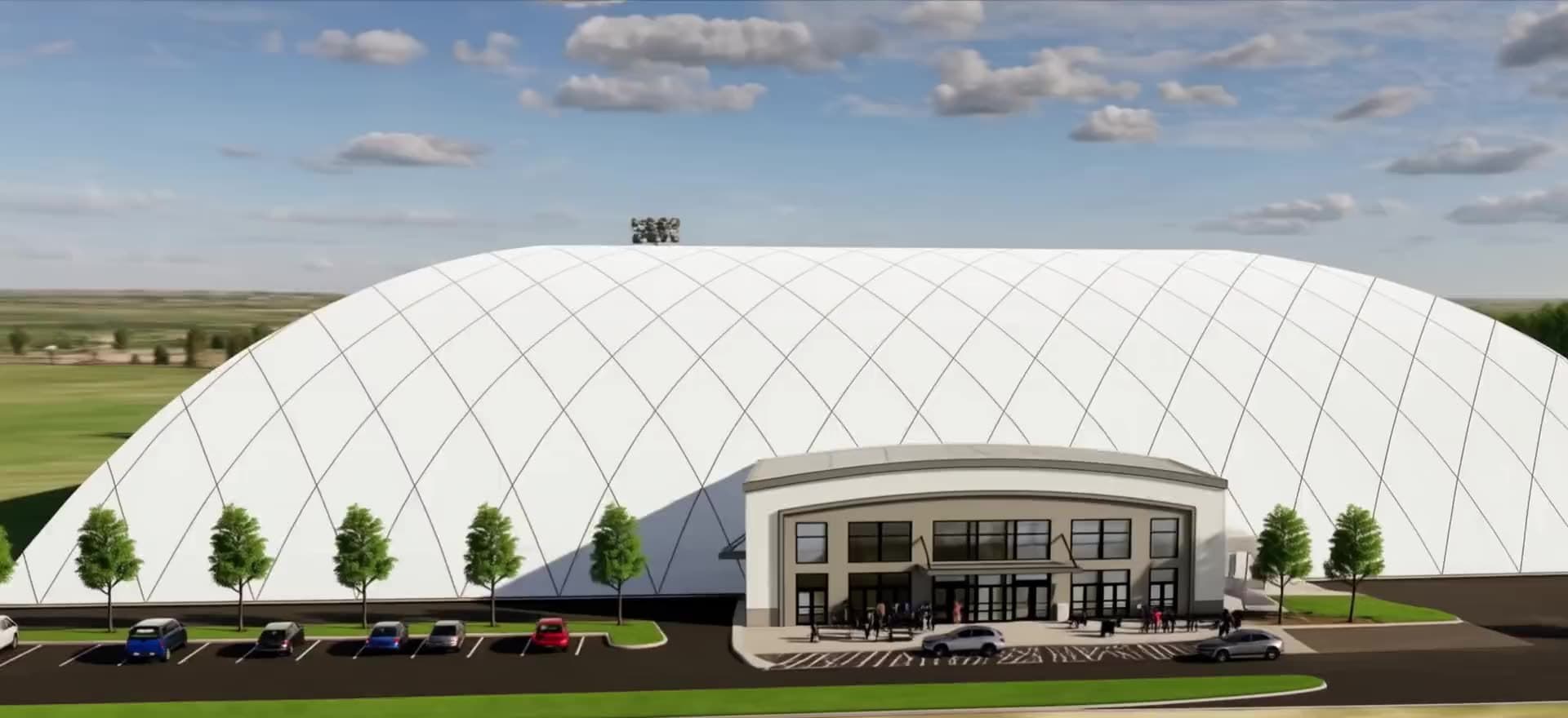 Concept rendering of the air-supported tennis dome and its entrance building.